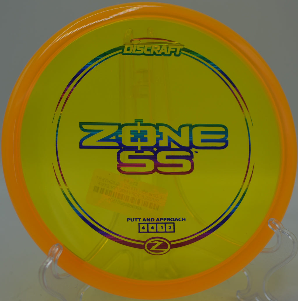 Discraft Z Zone SS carving a straight forehand approach at Harry Myers Disc Golf Course in Rockwall, Texas.
