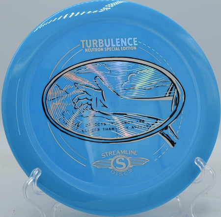 Neutron Turbulence skipping softly after a steep hyzer angle shot at DeLaveaga Disc Golf Course.

