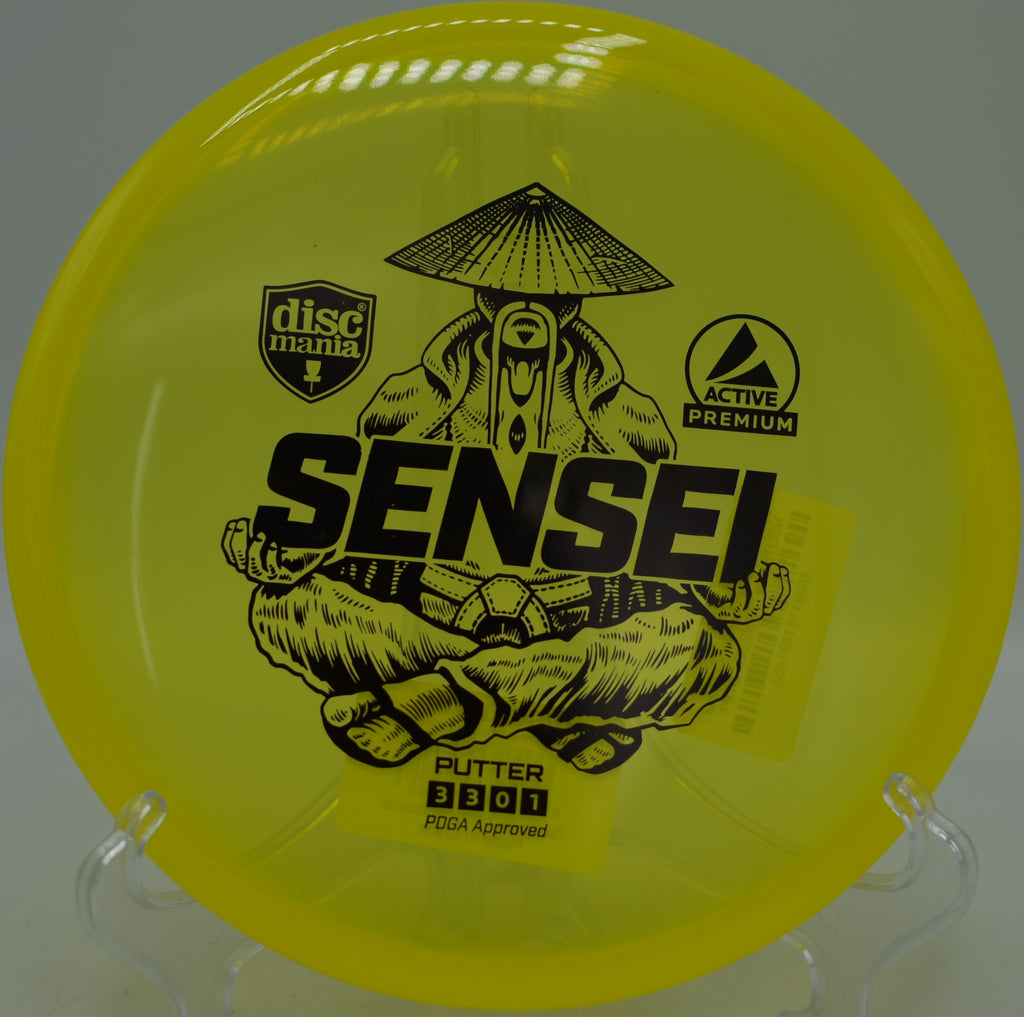 Transparent blue Active Premium Sensei released on a hyzerflip line at Maple Hill Disc Golf Course in Leicester, Massachusetts.