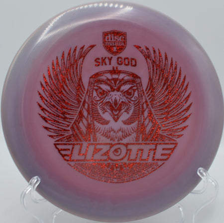 Sky God 2 P2 putter gliding cleanly through a wooded gap at Lake Stephens Disc Golf Course in Aberdeen, South Dakota, demonstrating stable flight, confident hand feel, and trusted performance for approach-focused disc golfers
