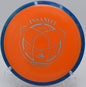 The Fission Insanity disc mid-flight on the fairway at Hornet’s Nest Disc Golf Course in Charlotte, North Carolina, demonstrating its glide and slight turn for controlled distance throws.