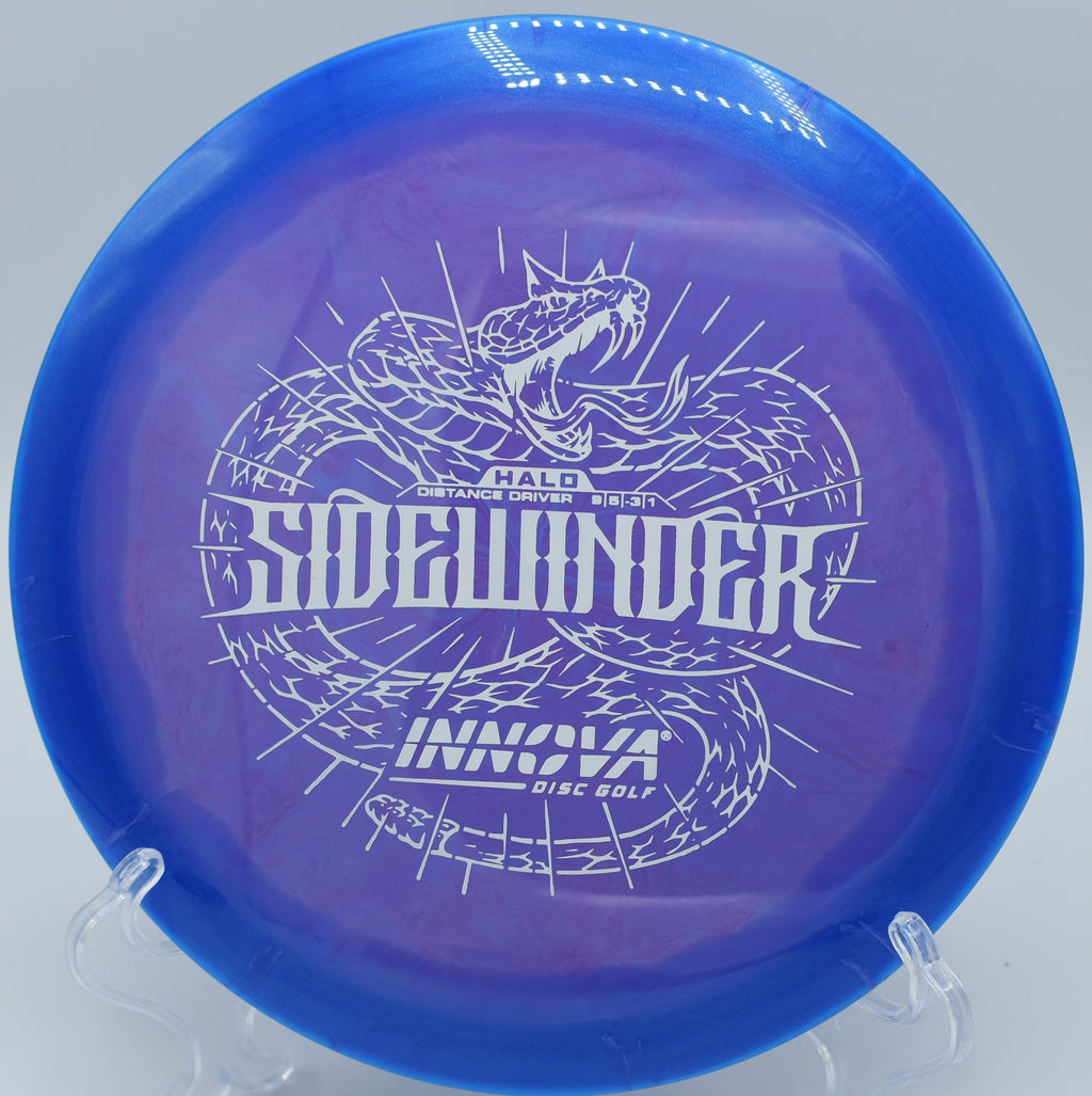 An Innova Halo Star Sidewinder smoothly flipping up to flat on a downhill shot at Timber Park Disc Golf Course in Estacada, Oregon.