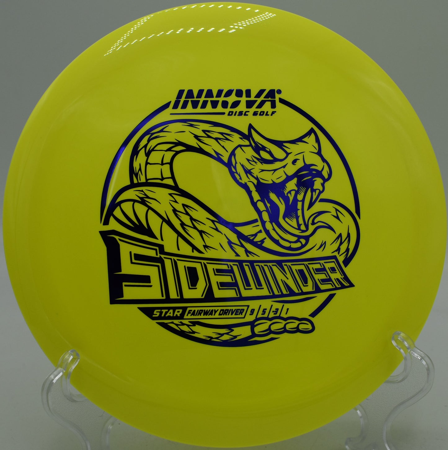 Star plastic Sidewinder soaring on an S-curve at Maple Hill Disc Golf Course in Leicester, Massachusetts