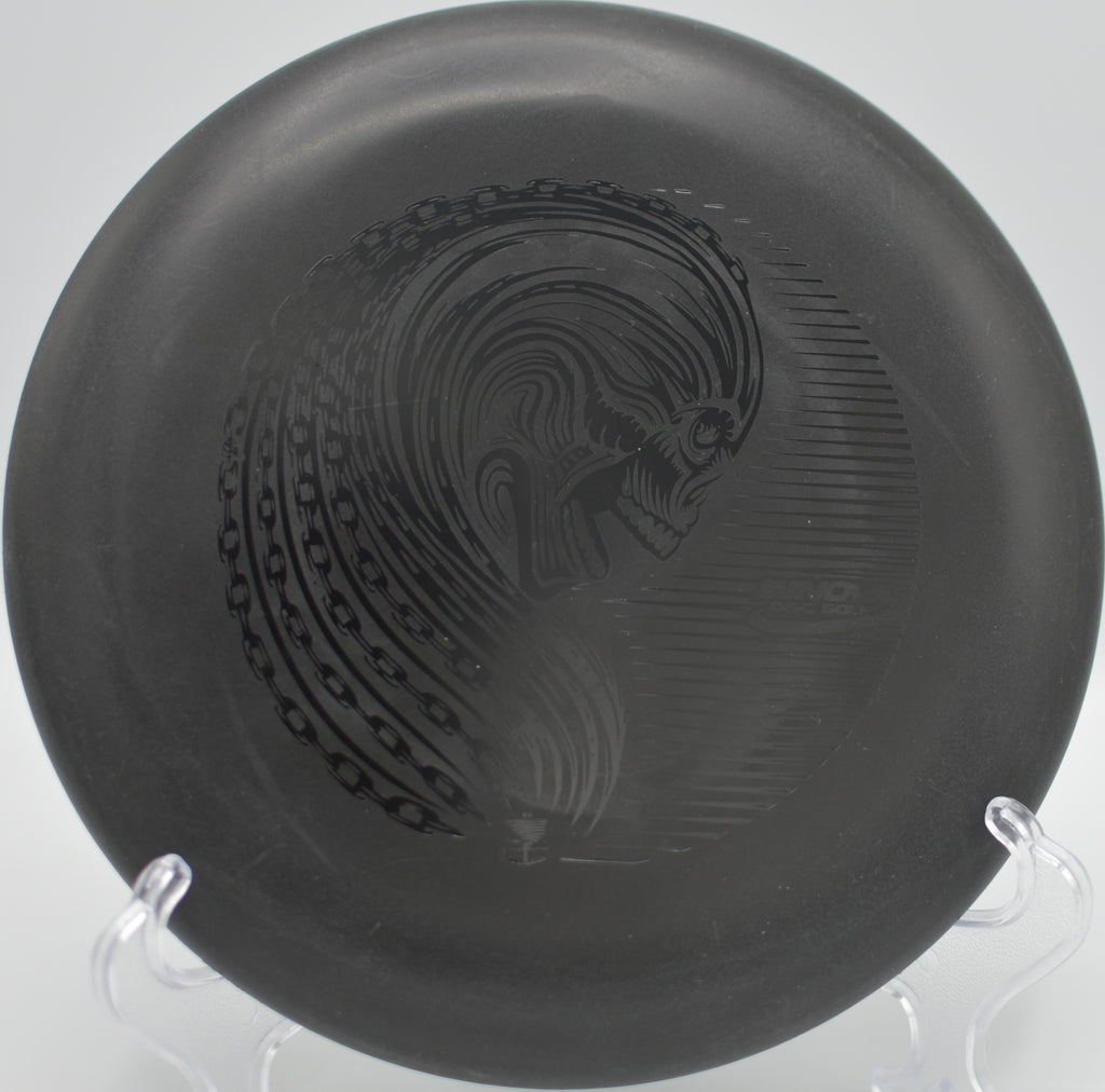 Black DX Aviar streaking down the fairway at Ukiah Disc Golf Course in Ukiah, California.