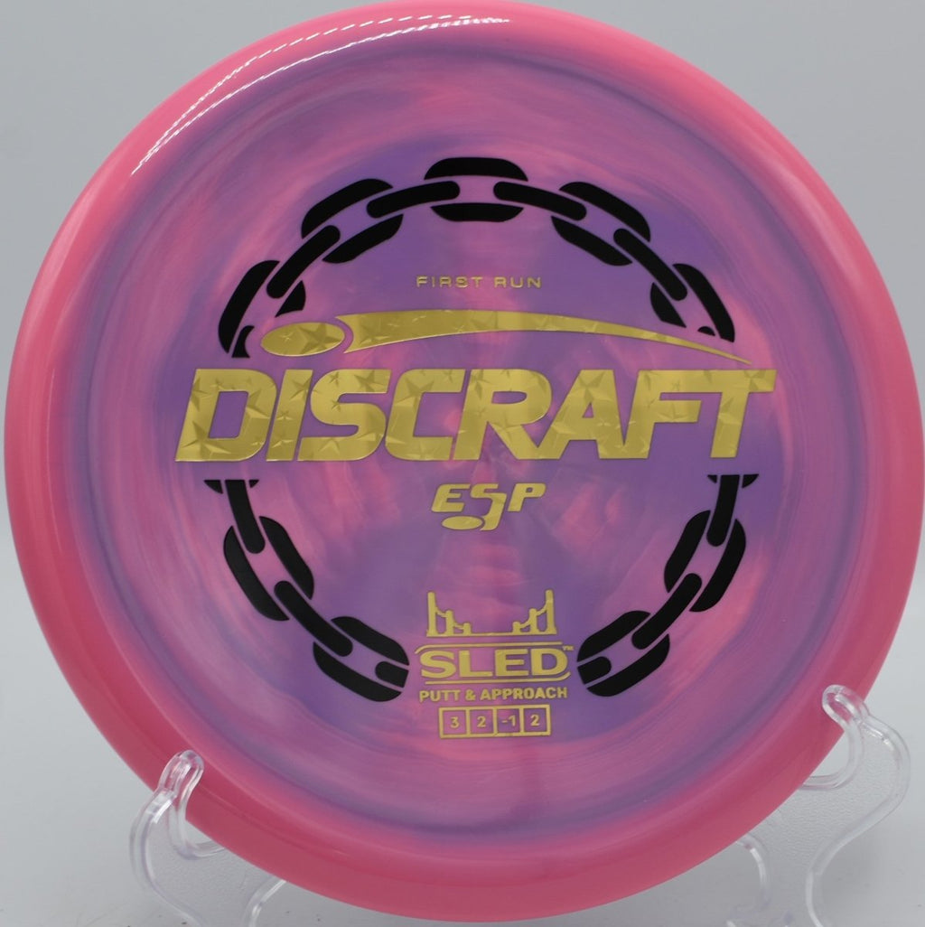 Discraft First Run ESP Sled touch forehand approach on technical green at Sugaw Creek Disc Golf Course in Charlotte, North Carolina