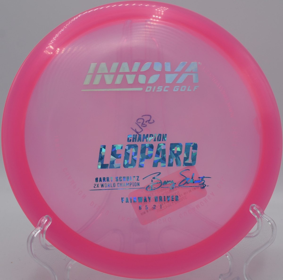 Champion Leopard fairway driver shaping a finesse backhand line with glide at Eagle Valley Disc Golf Course in Carson City, Nevada