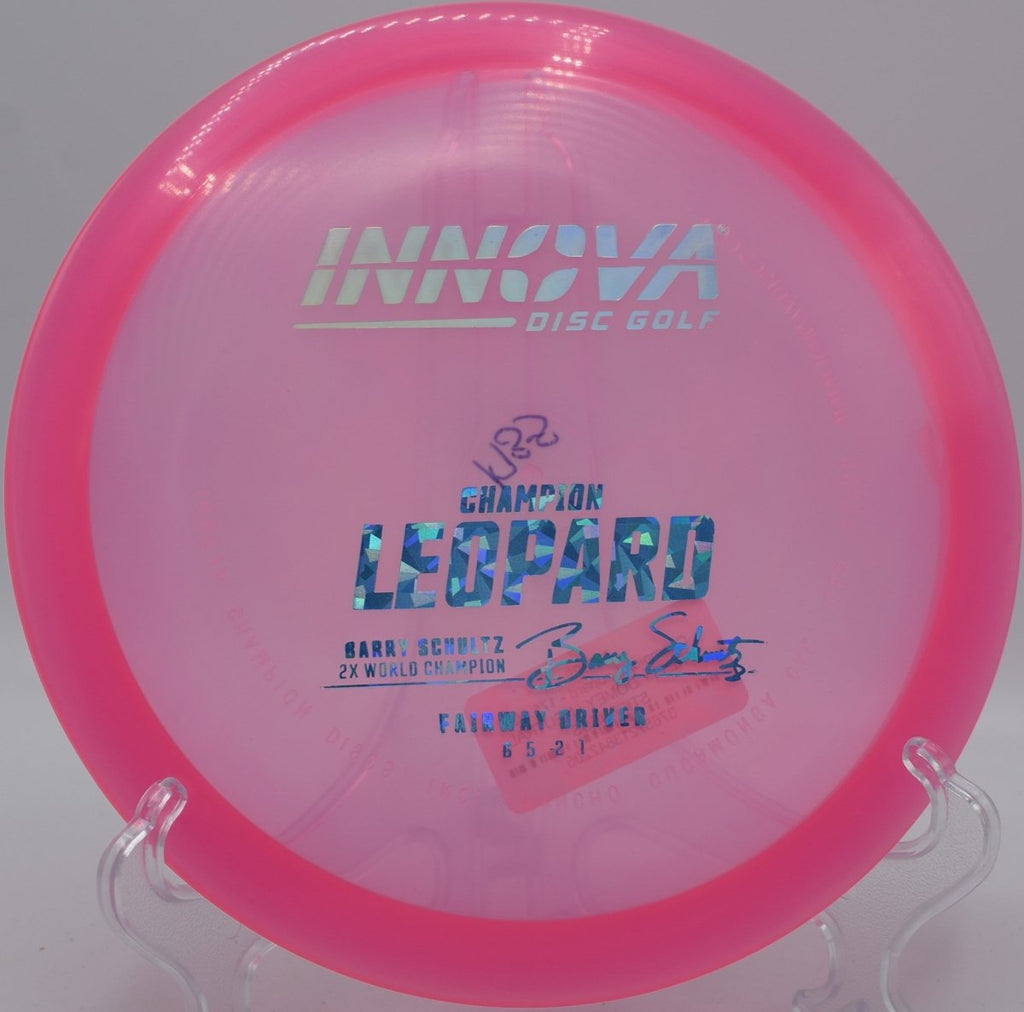 Champion Leopard fairway driver shaping a finesse backhand line with glide at Eagle Valley Disc Golf Course in Carson City, Nevada