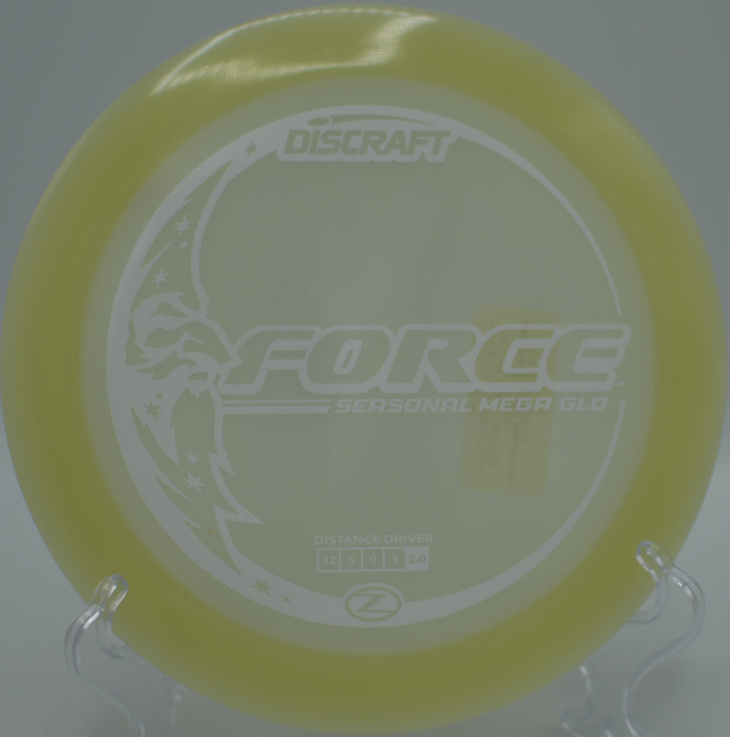Mega Glow Z Force glowing over the basket on a flex line at Winthrop Gold Disc Golf Course in Rock Hill, South Carolina.