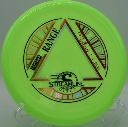 MVP Neutron Soft Range approach disc sitting on the putting surface at Tom Triplett Park Disc Golf Course in Pooler, Georgia