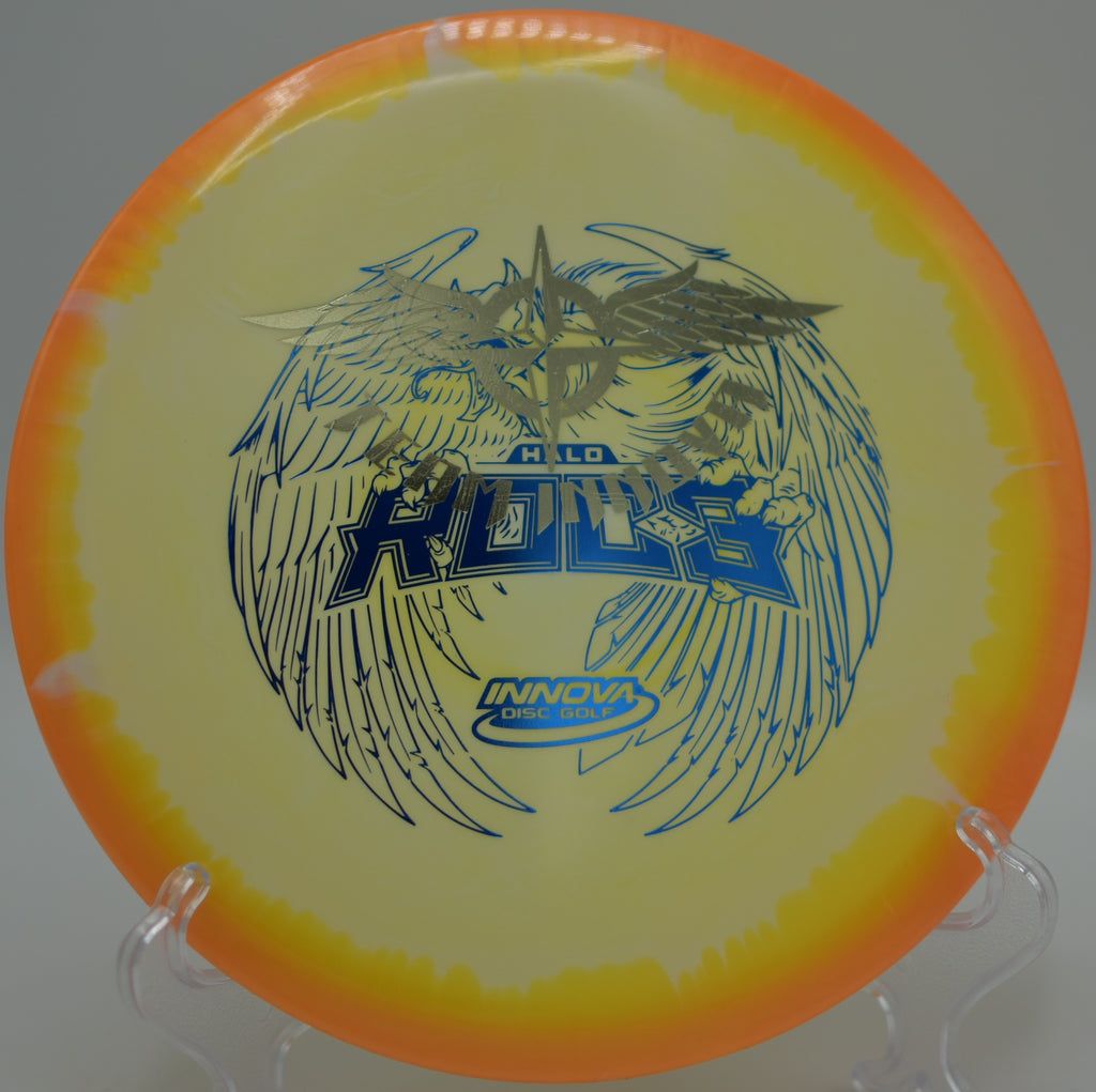 Player throwing a Halo Star Roc3 Team Stamp on a precise midrange drive through the woods at Idlewild Disc Golf Course in Burlington, Kentucky.