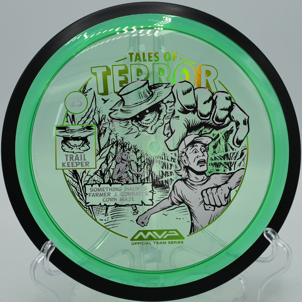 MVP Proton Trail with 2025 Halloween stamp flying a pinpoint forehand at Leviathan Disc Golf Course in Ludington, Michigan.