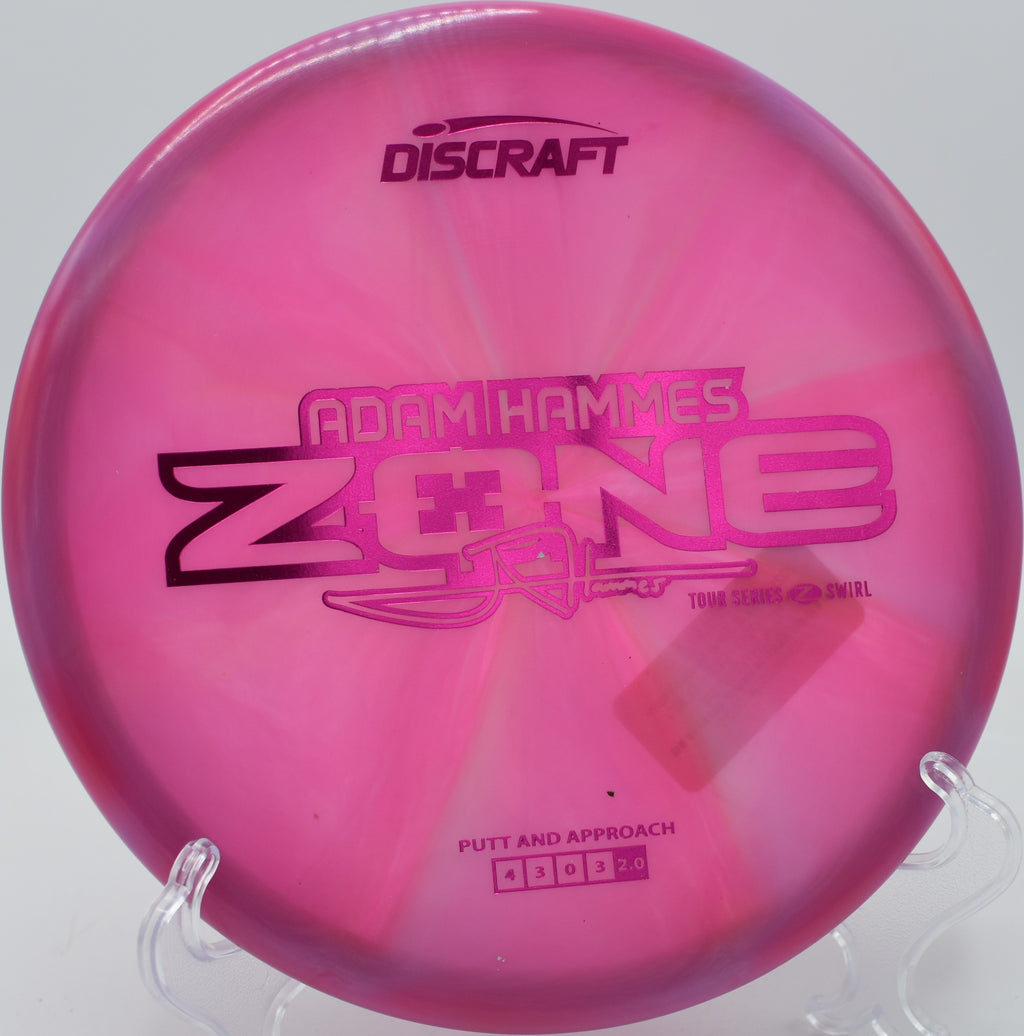 Swirled Z Zone spinning on grass at Brewster Ridge Disc Golf Course in Jeffersonville, Vermont.

