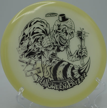 Discraft Mega Glo Halloween 2025 Single Stamped Buzzz flying laser-straight at The Sinks Disc Golf Course in Chattanooga, Tennessee.