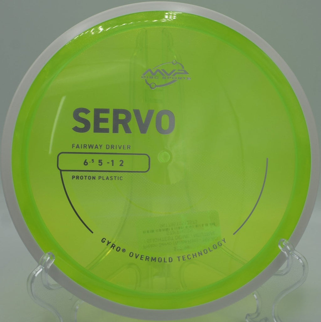 Proton Servo low, penetrating fairway drive at Wilco Disc Golf Course in Leander, Texas, holding line under power with dependable fade