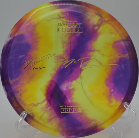 Fly Dye Z Luna McBeth edition resting near the water at Vista del Camino DGC in Scottsdale, AZ, highlighting its glidey, straight-to-fade flight.