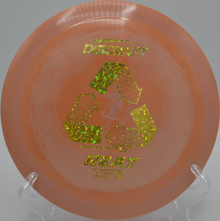 Player gripping a Discraft ESP Recycled Heat for a finesse drive at Thatcher Park Disc Golf Course in Safford, Arizona.