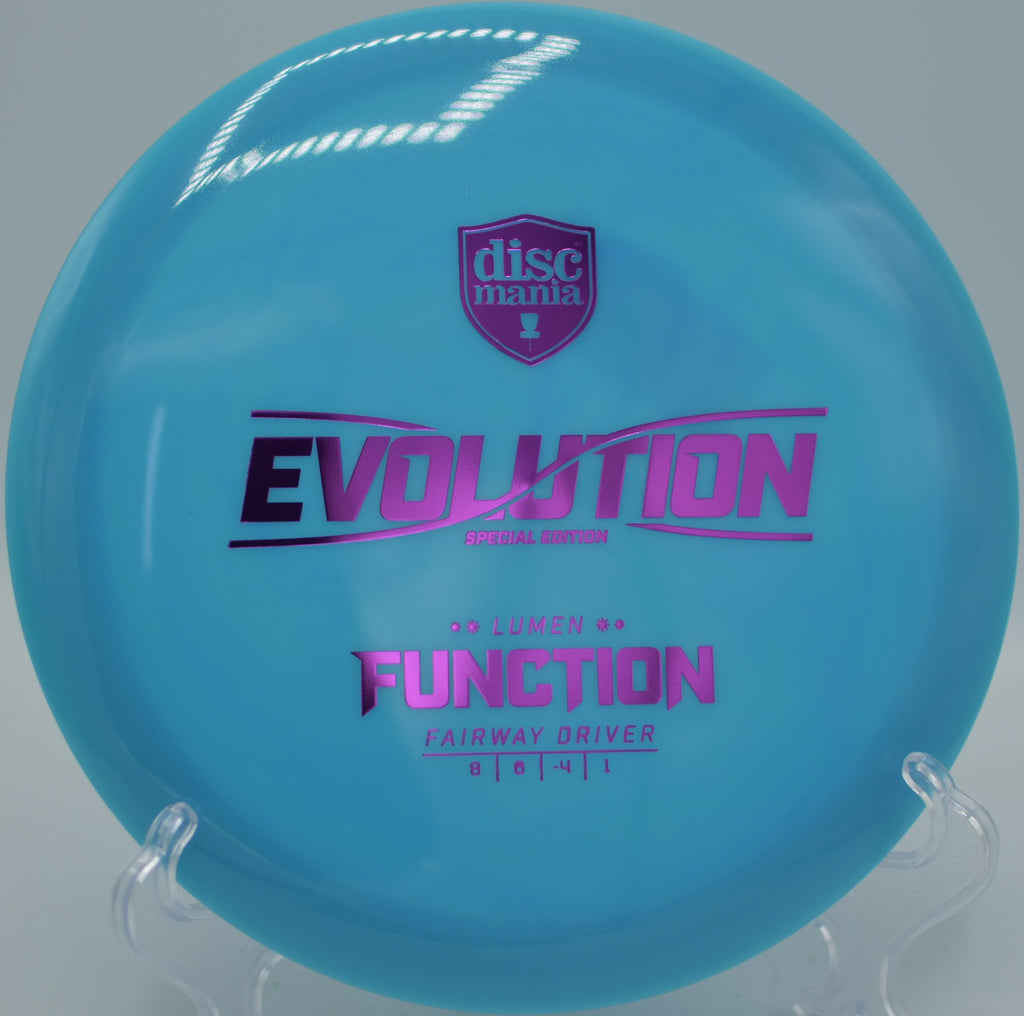 Neo Lumen Function Discmania glow control driver parked near the pin at Winthrop Gold Disc Golf Course in Rock Hill, South Carolina.