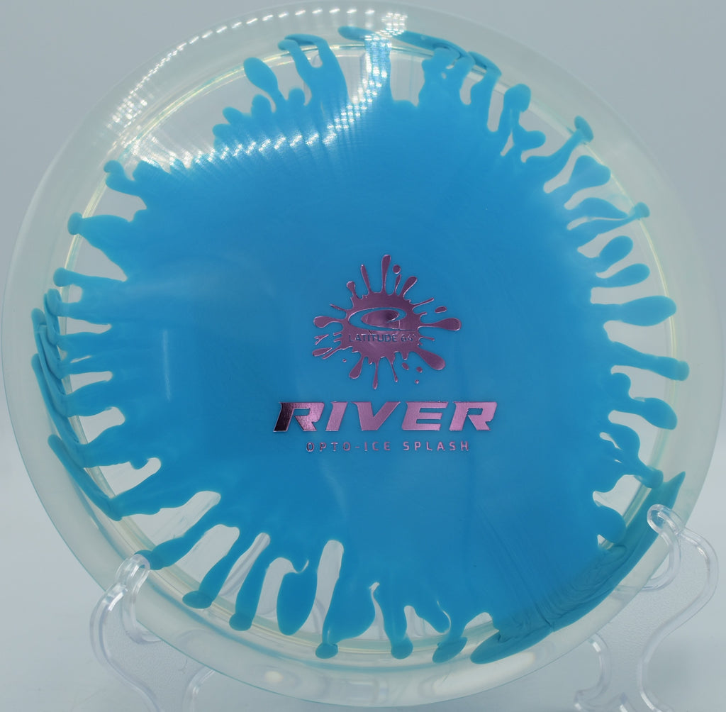 Latitude 64° River carving an S-curve at Flip City Disc Golf Park in Shelby, Michigan, highlighting the swirled Opto-Ice finish and easy distance.

