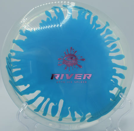 Latitude 64° River carving an S-curve at Flip City Disc Golf Park in Shelby, Michigan, highlighting the swirled Opto-Ice finish and easy distance.

