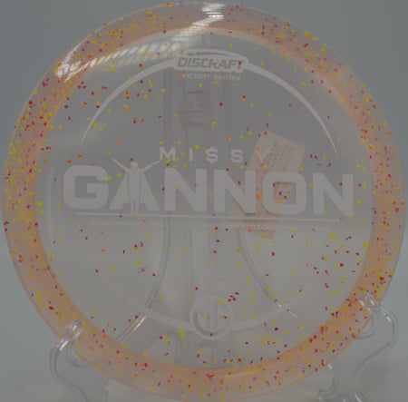 Missy Gannon Victory Edition Z CS Confetti Cicada ripping a fairway drive at North Cove Disc Golf Course in Marion, North Carolina.