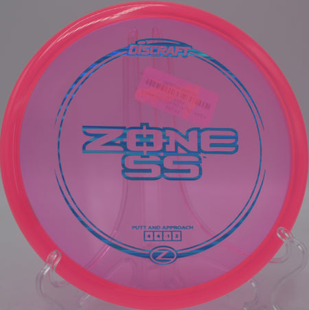Discraft Z Zone SS control putter shaping a line at Hornets Nest Disc Golf Course in Charlotte, North Carolina.