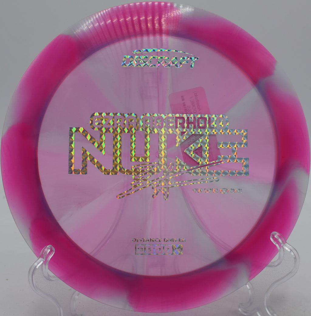 2025 Ezra Aderhold Z-Swirl Nuke launched on a towering distance drive at Winthrop Gold Disc Golf Course in Rock Hill, South Carolina.