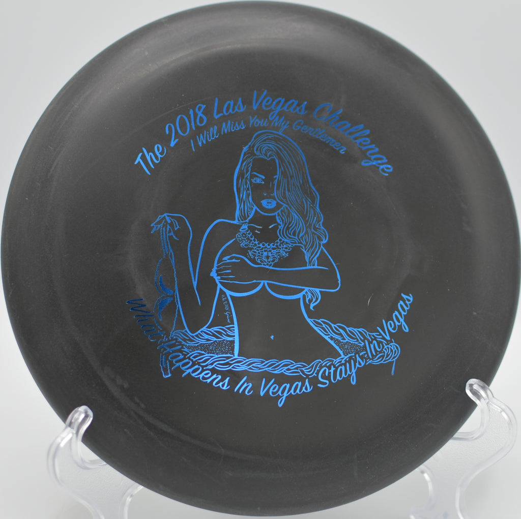 Close-up of Black DX Aviar with chain marks after a birdie putt at Condon Park Disc Golf Course in Grass Valley, California.