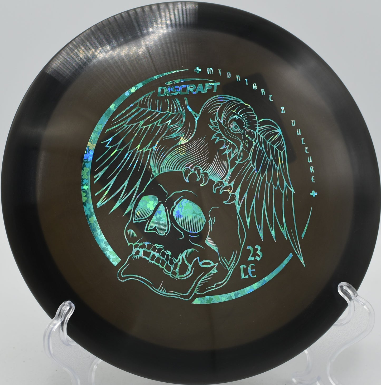 Discraft Midnight Z Vulture fairway driver ripping a controlled flex shot at Northwood Black Disc Golf Course in Morton, Illinois.