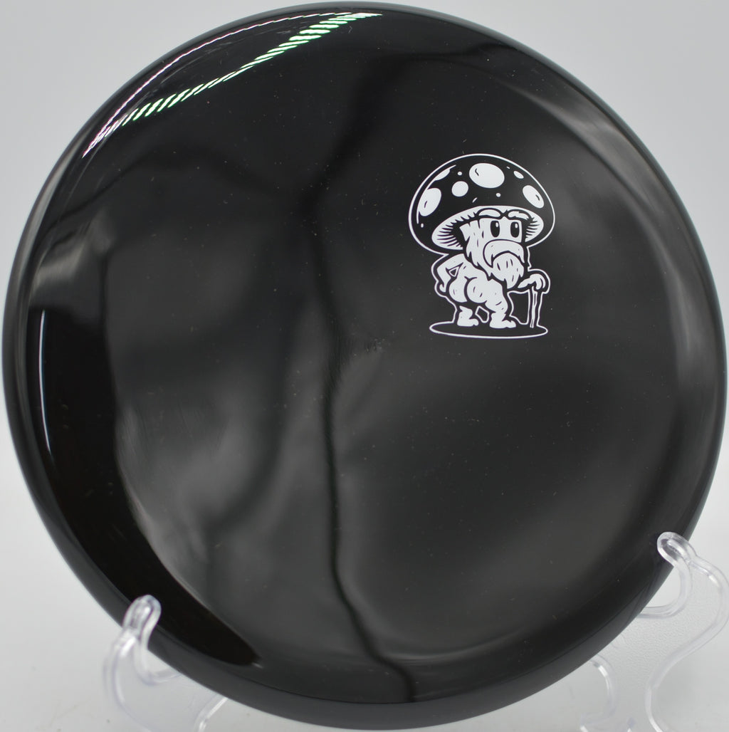 Doomsday Discs Rot Survival edition gliding true down a wooded tunnel at Idlewild Disc Golf Course in Burlington, Kentucky.
