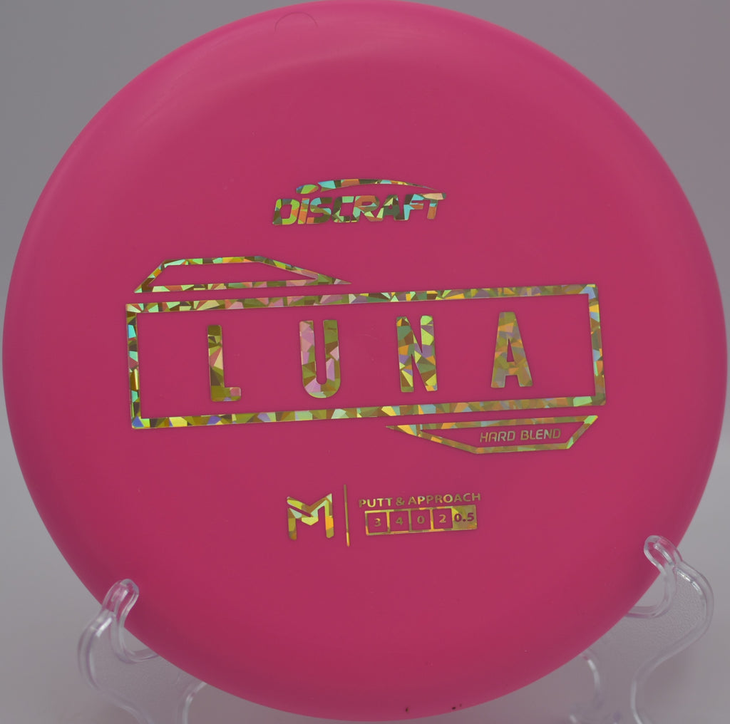 Paul McBeth Hard Blend Luna spinning flat and controlled toward the pin at Trojan Park Disc Golf Course in Rainier, Oregon.