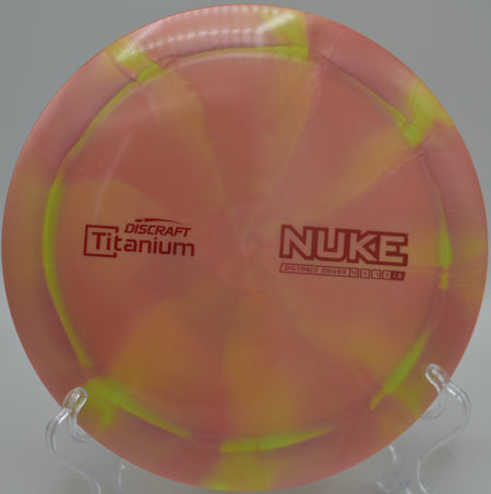 Player gripping a Discraft Titanium Nuke before a max-distance rip at Stafford Lake Disc Golf Course in Novato, California.