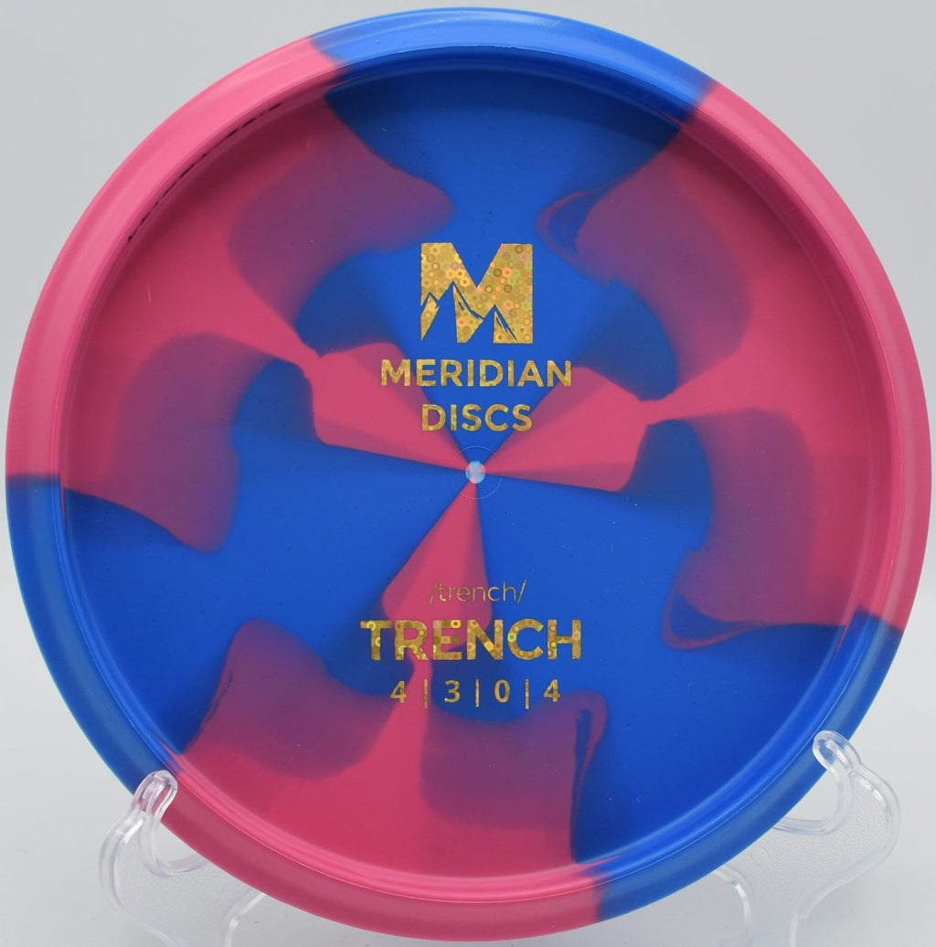 Marbled Graphite Trench reliable hyzer finish on wooded hole at Blue Ribbon Pines Disc Golf Course in East Bethel, Minnesota