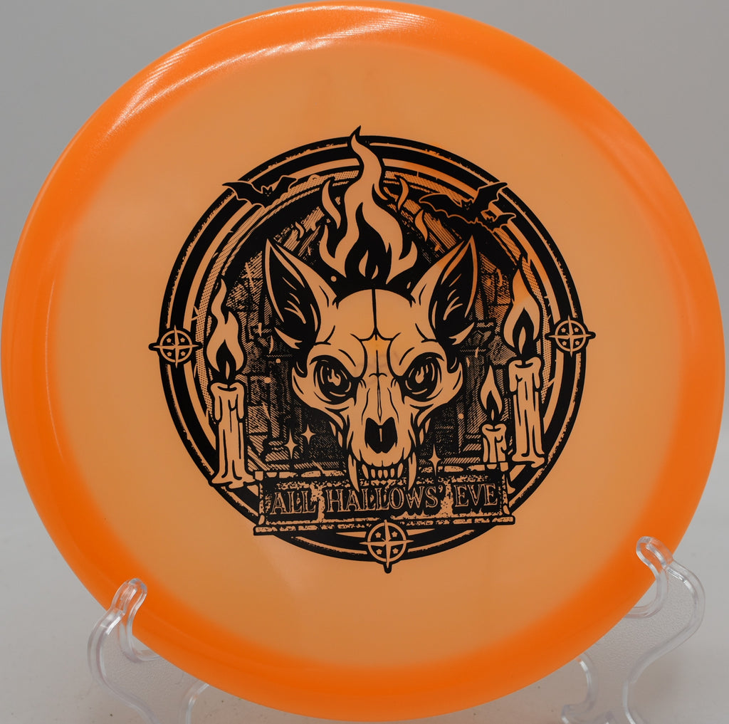 Champion Proto Glow Fox disc threading a wooded fairway gap at Milo McIver Disc Golf Course in Estacada, Oregon