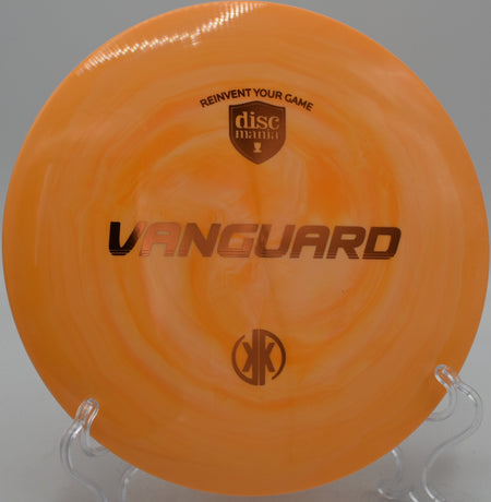 Discmania Creator Series Swirl S-Line Vanguard fairway driver carving a controlled line at Maple Hill Disc Golf Course in Leicester, Massachusetts