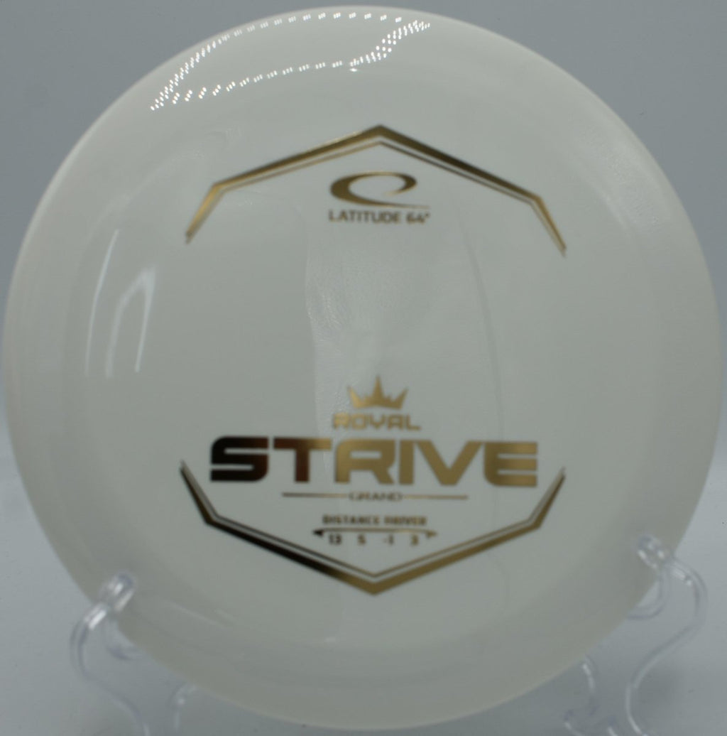 Latitude 64 Grand Strive distance driver on hillside fairway at Beaver Ranch Disc Golf Course in Conifer, Colorado