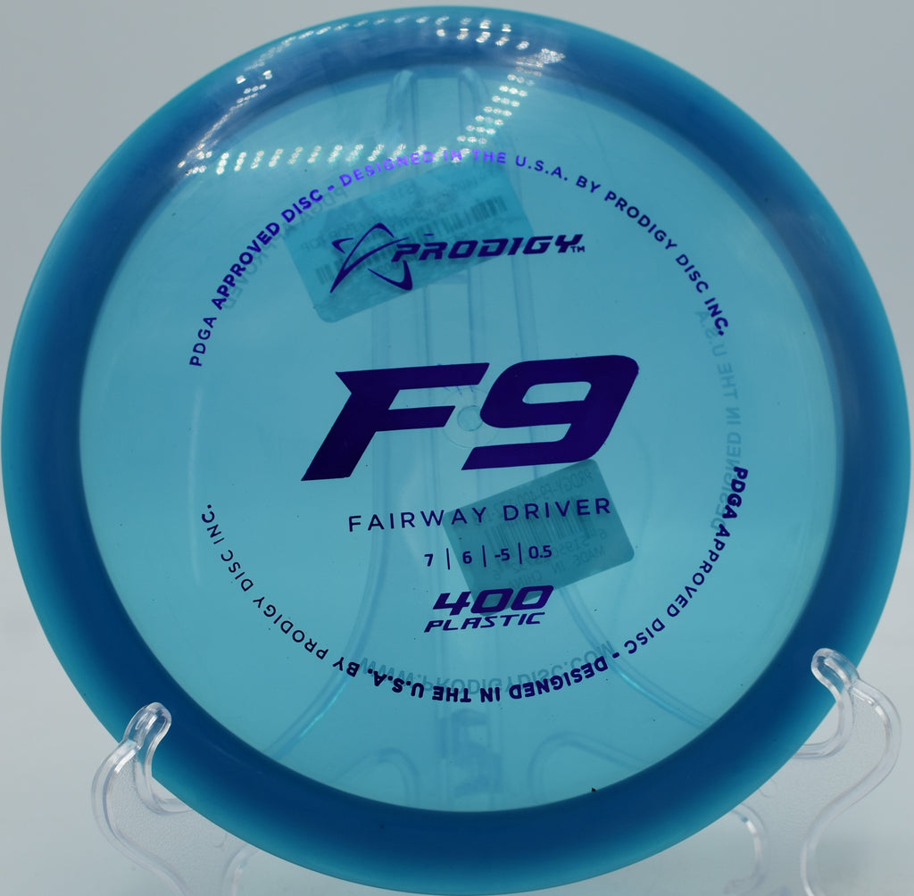 Prodigy F9 400 plastic mid-flight turnover shot at Brackenridge Park Disc Golf Course in San Antonio, Texas.