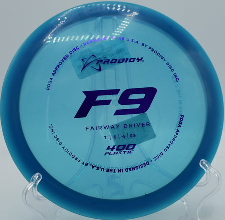 Prodigy F9 400 plastic mid-flight turnover shot at Brackenridge Park Disc Golf Course in San Antonio, Texas.