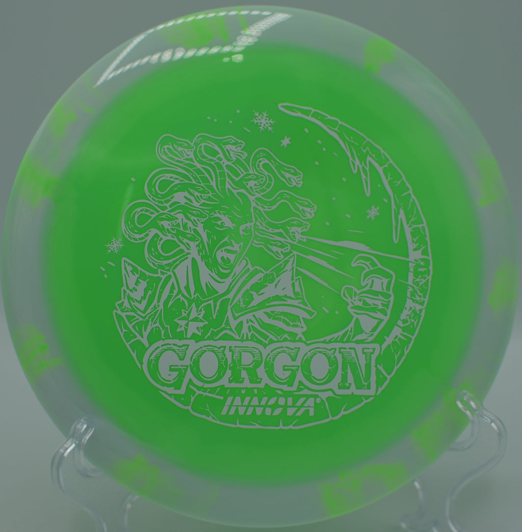 Holiday Edition Gorgon riding a turnover line at Idlewild DGC in Burlington, KY, gliding deep down the fairway before flexing out subtly.