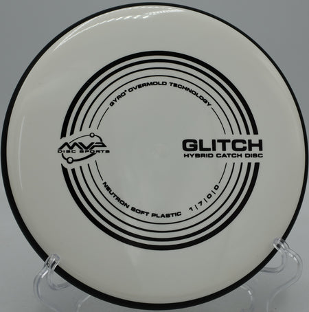 Neutron Glitch MVP control disc carving straight lines at Northwood Black Disc Golf Course in Morton, Illinois.