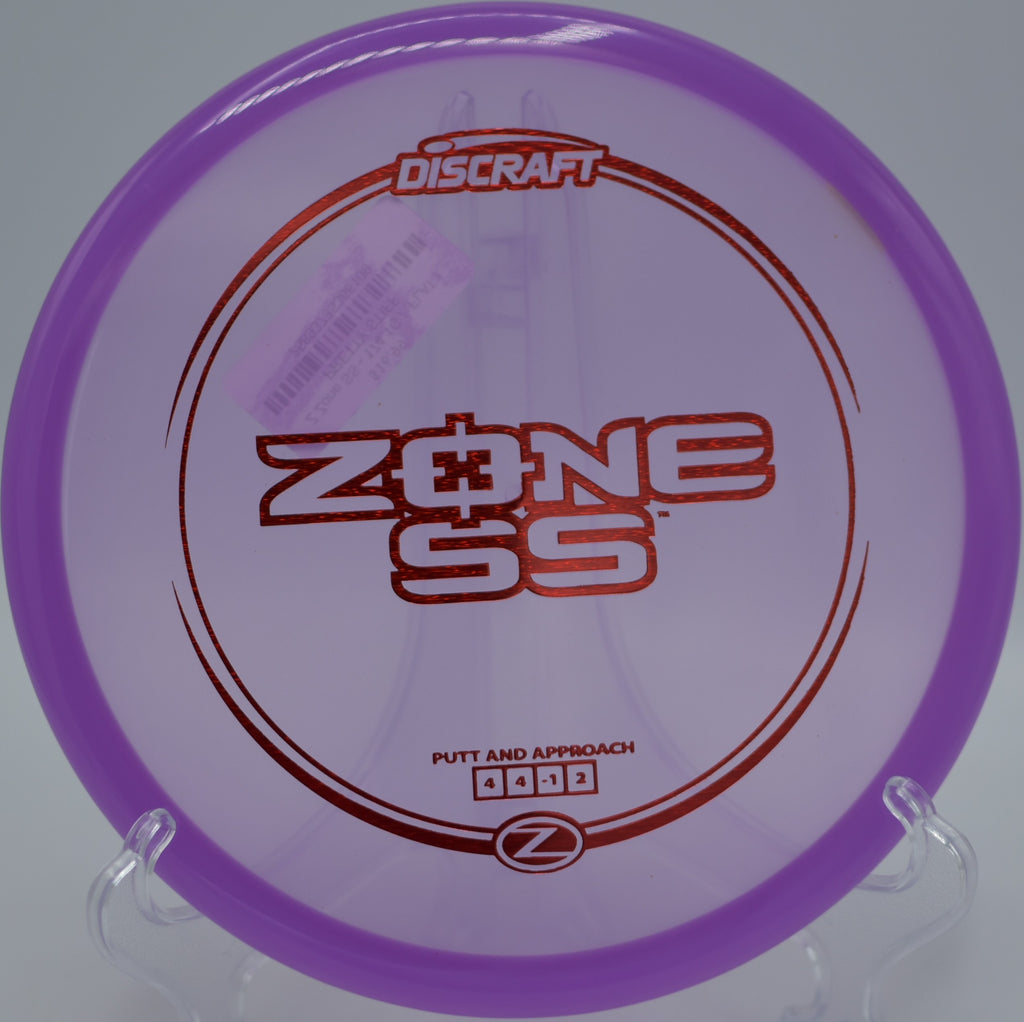 Discraft Z Zone SS dropping perfectly into the basket after a precision putt at Rocklin Disc Golf Course in Rocklin, California.