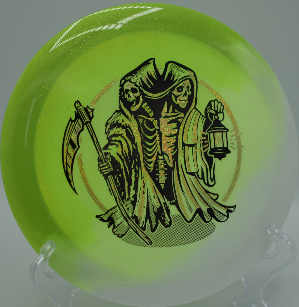 Split-blend Duo Wraith photographed on a hillside fairway at The Foz DGC in Fairbanks, AK, optimized for controlled distance flights.