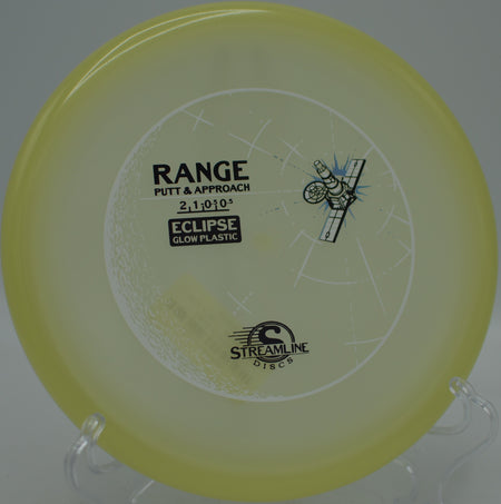 Eclipse Glow Range carving a straight line on a wooded approach at Moraine State Park Disc Golf Course in Portersville, Pennsylvania.