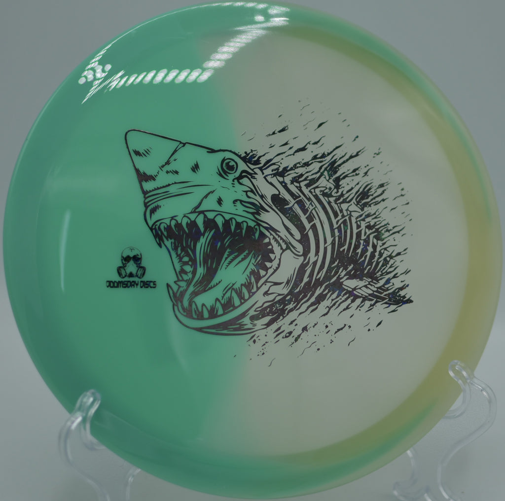 Doomsday Discs Retina Glow Chemtrail positioned for a night round at Sinks Disc Golf Course in Chattanooga, TN, built for glidey hyzer flips.