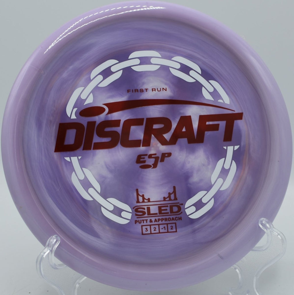 Discraft First Run ESP Sled touch backhand upshot near basket at The Preserve Disc Golf Course in Clearwater, Minnesota