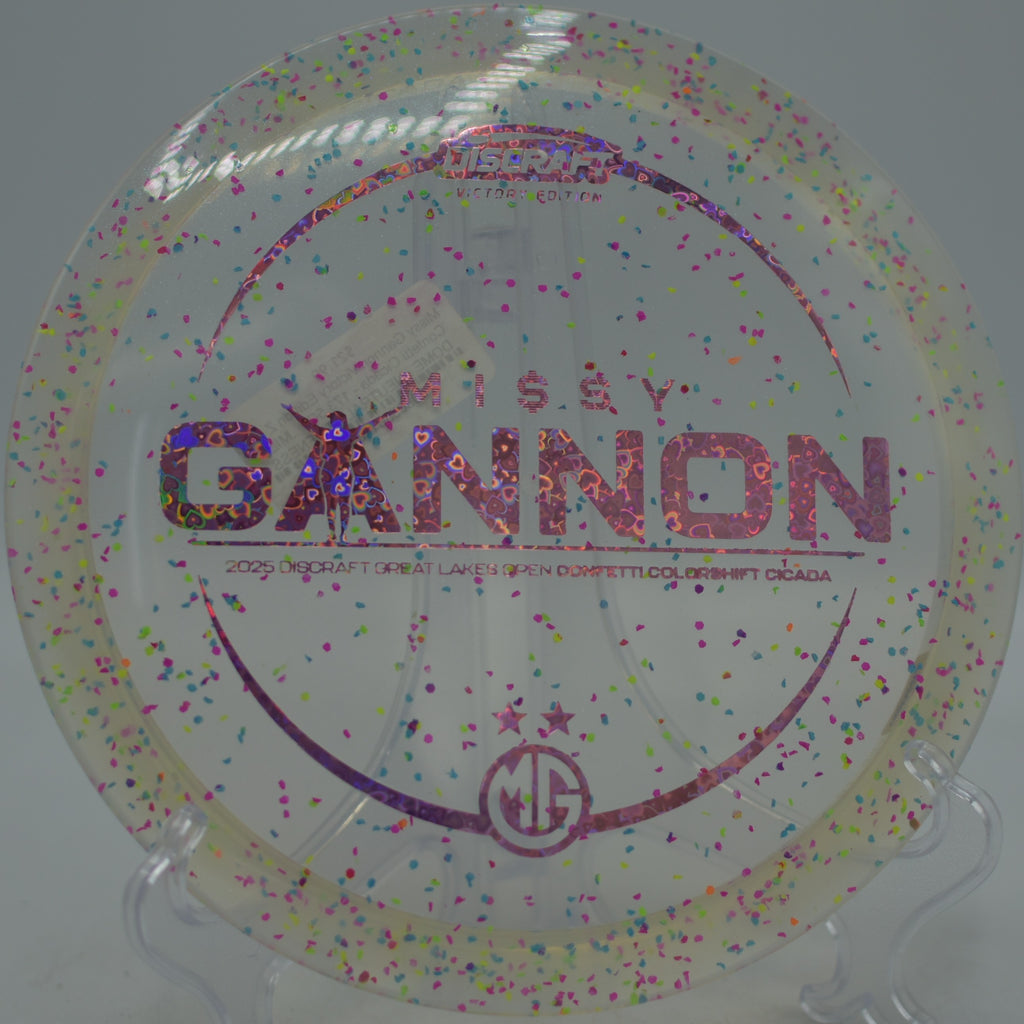Discraft Z CS Confetti Cicada Missy Gannon edition floating flat with fade at Tyler State Park Disc Golf Course in Newtown, Pennsylvania.