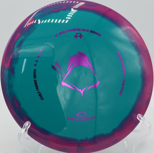 Grand Orbit Sweep Latitude 64° Isaac Robinson 2025 signature driver shredding wooded fairways at Northwood Black Disc Golf Course in Morton, Illinois.