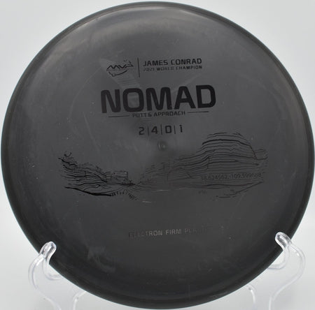 MVP Electron Firm Nomad putter parked on the putting surface after a soft landing upshot at Columbia Park Disc Golf Course in Kennewick, Washington