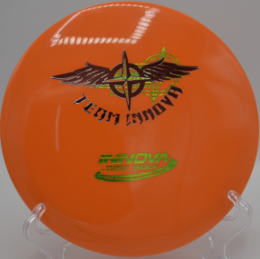Innova Star Teebird (Team Stamp) soaring down a tight fairway at North Cove Disc Golf Course in Marion, North Carolina, showcasing its smooth, stable flight.