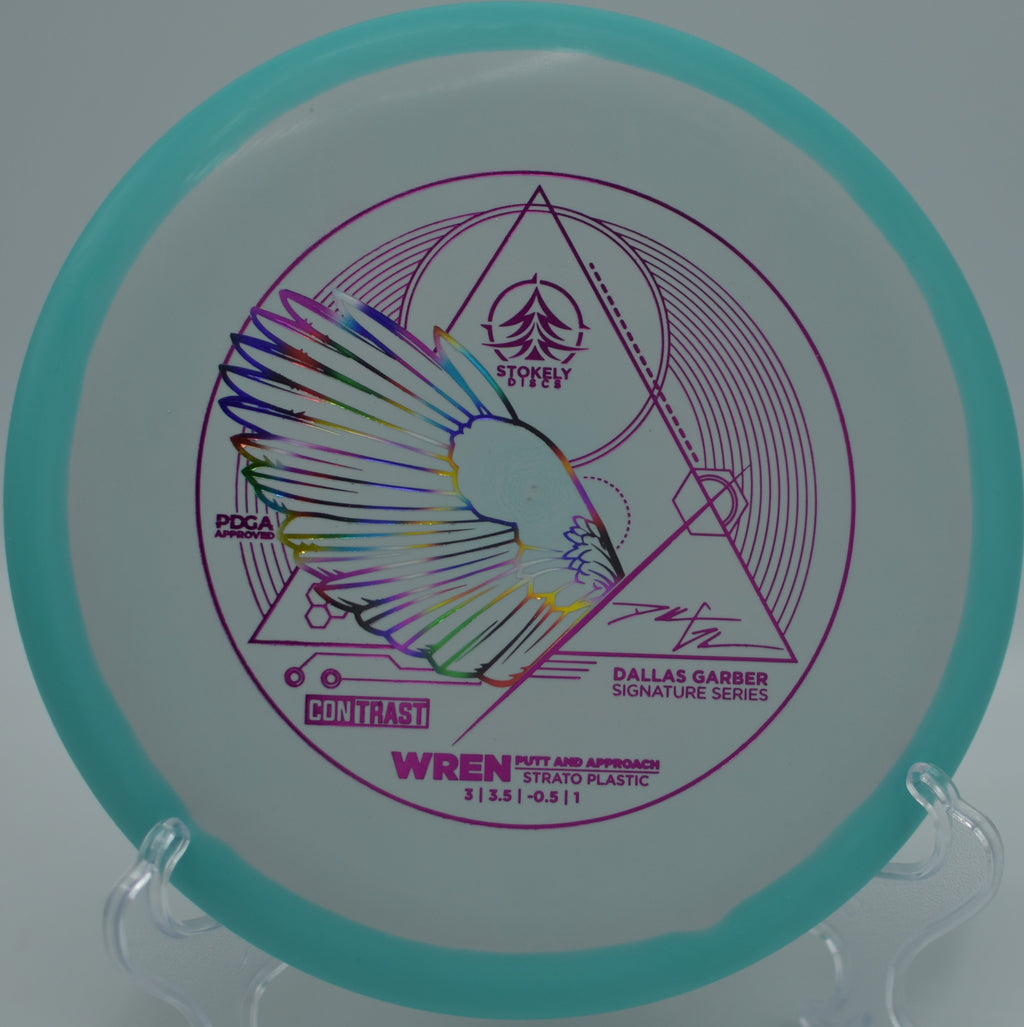 Contrast Strato Wren landing softly near the pin after a clean release at Shelby Forest Disc Golf Course in Millington, Tennessee.