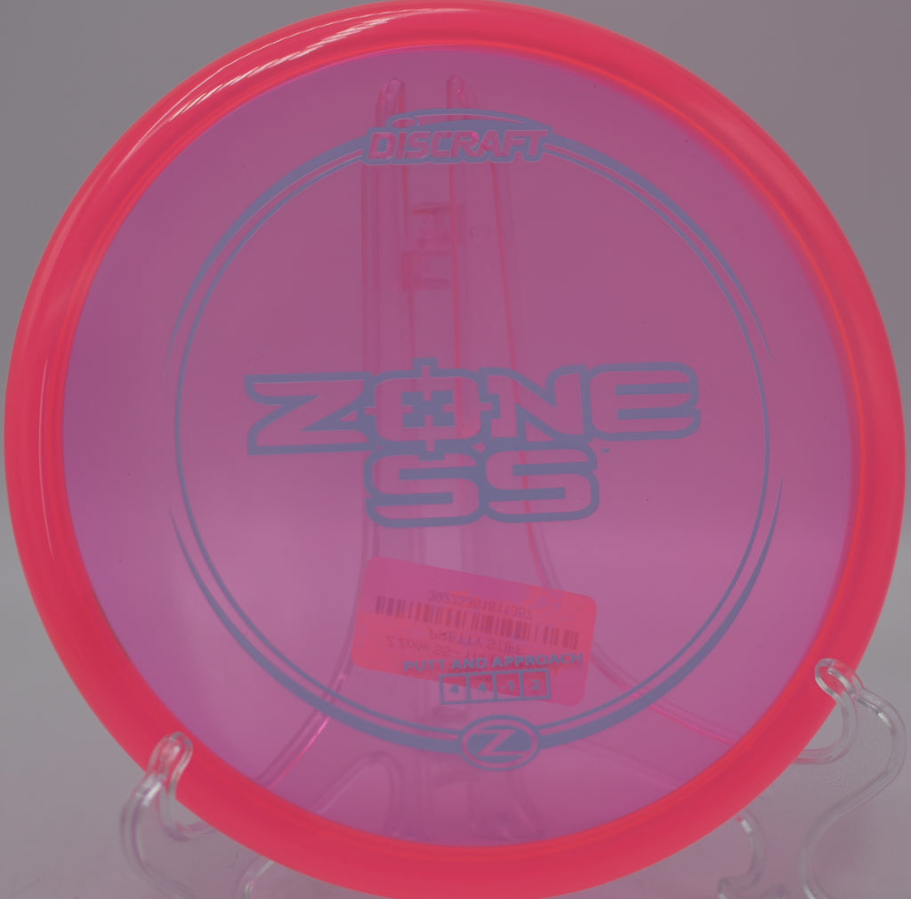 Discraft Z Zone SS placed perfectly on a wooded fairway at North Cove Disc Golf Course in Marion, North Carolina.